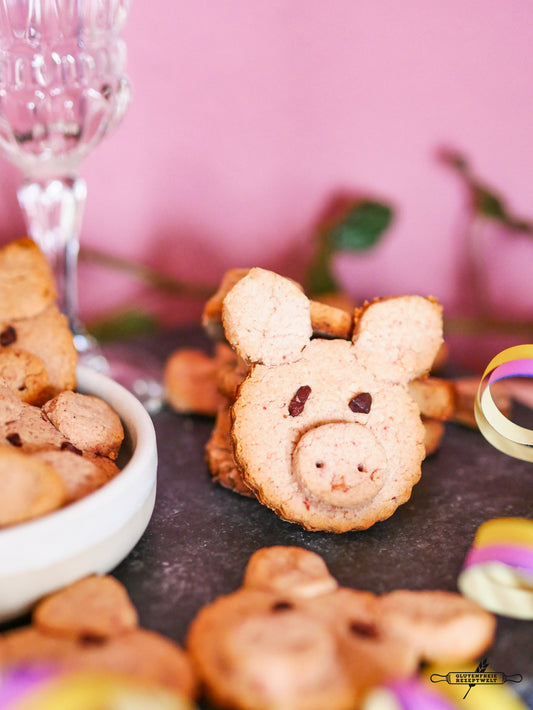Schweinchenplätzchen mit Schokoaugen